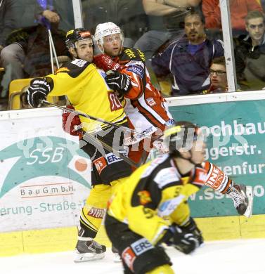 EBEL. Eishockey Bundesliga. KAC gegen UPC Vienna Capitals. Thomas Poeck,  (KAC), Michael Schiechl (Caps). Klagenfurt, am 10.10.2014.
Foto: Kuess 

---
pressefotos, pressefotografie, kuess, qs, qspictures, sport, bild, bilder, bilddatenbank