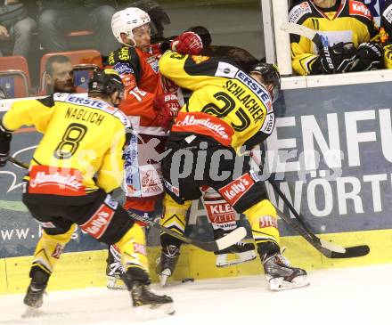 EBEL. Eishockey Bundesliga. KAC gegen UPC Vienna Capitals. Thomas Koch, (KAC), Markus Schlacher  (Caps). Klagenfurt, am 10.10.2014.
Foto: Kuess 

---
pressefotos, pressefotografie, kuess, qs, qspictures, sport, bild, bilder, bilddatenbank