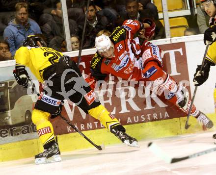 EBEL. Eishockey Bundesliga. KAC gegen UPC Vienna Capitals. Jan Urbas, (KAC), Jonathan Ferland  (Caps). Klagenfurt, am 10.10.2014.
Foto: Kuess 

---
pressefotos, pressefotografie, kuess, qs, qspictures, sport, bild, bilder, bilddatenbank