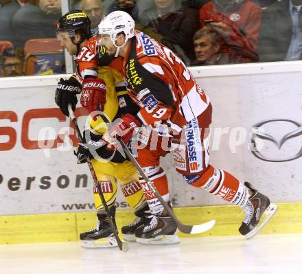 EBEL. Eishockey Bundesliga. KAC gegen UPC Vienna Capitals. Jacques Jean Francois,  (KAC), Peter MacArthur  (Caps). Klagenfurt, am 10.10.2014.
Foto: Kuess 

---
pressefotos, pressefotografie, kuess, qs, qspictures, sport, bild, bilder, bilddatenbank