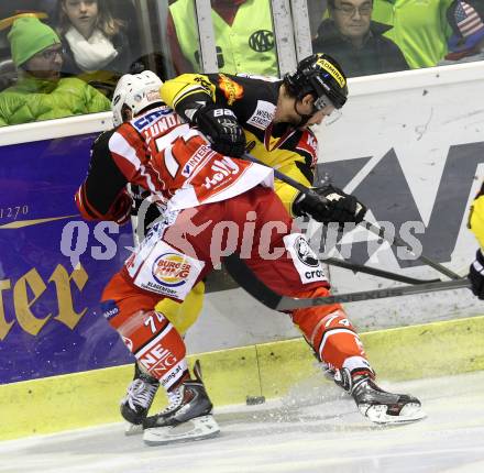 EBEL. Eishockey Bundesliga. KAC gegen UPC Vienna Capitals. Jamie Lundmark,  (KAC), Florian Iberer (Caps). Klagenfurt, am 10.10.2014.
Foto: Kuess 

---
pressefotos, pressefotografie, kuess, qs, qspictures, sport, bild, bilder, bilddatenbank