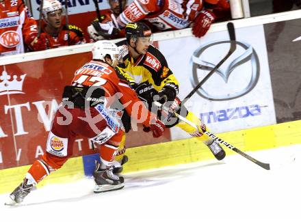 EBEL. Eishockey Bundesliga. KAC gegen UPC Vienna Capitals. Marcel Witting, (KAC), Sascha Bauer  (Caps). Klagenfurt, am 10.10.2014.
Foto: Kuess 

---
pressefotos, pressefotografie, kuess, qs, qspictures, sport, bild, bilder, bilddatenbank