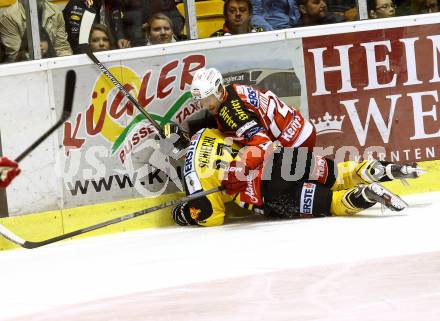 EBEL. Eishockey Bundesliga. KAC gegen UPC Vienna Capitals. Jamie Lundmark,  (KAC), Michael Schiechl (Caps). Klagenfurt, am 10.10.2014.
Foto: Kuess 

---
pressefotos, pressefotografie, kuess, qs, qspictures, sport, bild, bilder, bilddatenbank