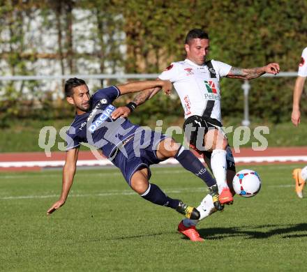 Fussball. Freundschaftsspiel. RZ Pellets WAC gegen Udinese Calcio. Attila Simon (WAC), Giampiero Pinzi (Udinese). Villach, 10.10.2014.
Foto: Kuess
---
pressefotos, pressefotografie, kuess, qs, qspictures, sport, bild, bilder, bilddatenbank