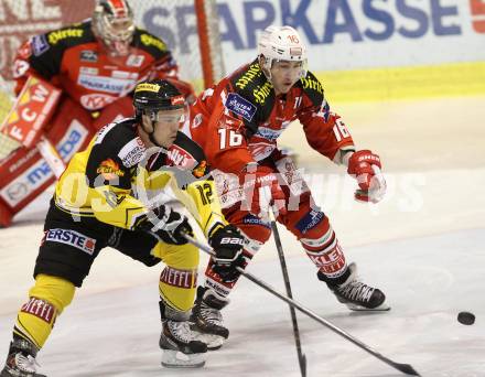 EBEL. Eishockey Bundesliga. KAC gegen UPC Vienna Capitals.  Patrick Harand, (KAC), Dustin Sylvester (Caps). Klagenfurt, am 10.10.2014.
Foto: Kuess 

---
pressefotos, pressefotografie, kuess, qs, qspictures, sport, bild, bilder, bilddatenbank