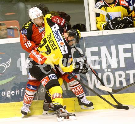 EBEL. Eishockey Bundesliga. KAC gegen UPC Vienna Capitals. Thomas Koch,  (KAC), Markus Schlacher (Caps). Klagenfurt, am 10.10.2014.
Foto: Kuess 

---
pressefotos, pressefotografie, kuess, qs, qspictures, sport, bild, bilder, bilddatenbank