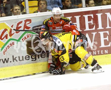 EBEL. Eishockey Bundesliga. KAC gegen UPC Vienna Capitals. Jamie Lundmark, (KAC), Michael Schiechl  (Caps). Klagenfurt, am 10.10.2014.
Foto: Kuess 

---
pressefotos, pressefotografie, kuess, qs, qspictures, sport, bild, bilder, bilddatenbank