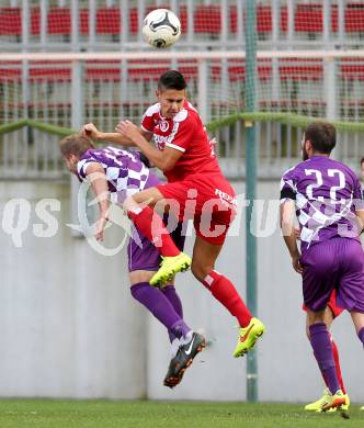 Fussball Regionalliga. SK Austria Klagenfurt gegen Vorwaerts Steyr. Armend Spreco, (Austria Klagenfurt), Kevin Padilla Gonzalez  (Vorwaerts Steyr). Klagenfurt, 11.10.2014.
Foto: Kuess
---
pressefotos, pressefotografie, kuess, qs, qspictures, sport, bild, bilder, bilddatenbank