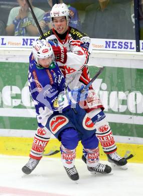 EBEL. Eishockey Bundesliga. EC VSV gegen KAC. Marco Pewal,  (VSV), Thomas Hundertpfund (KAC). Villach, am 12.10.2014.
Foto: Kuess 


---
pressefotos, pressefotografie, kuess, qs, qspictures, sport, bild, bilder, bilddatenbank