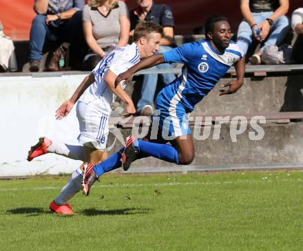 Fussball Kaerntner Liga. Annabichler SV ASV gegen Treibach. Makanda Christian Mpaka, (ASV), Roman Adunka (Treibach) . Klagenfurt, am 12.10.2014.
Foto: Kuess
---
pressefotos, pressefotografie, kuess, qs, qspictures, sport, bild, bilder, bilddatenbank