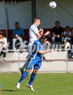 Fussball Kaerntner Liga. Annabichler SV ASV gegen Treibach. Niko Maric, (ASV), Julian Huebl (Treibach) . Klagenfurt, am 12.10.2014.
Foto: Kuess
---
pressefotos, pressefotografie, kuess, qs, qspictures, sport, bild, bilder, bilddatenbank