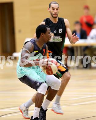 Basketball 2. Bundesliga.  Raiders Villach gegen Basket Flames. Jamal Mc Clerkin, (Villach), Dominik Muellner (Basket Flames). Villach, 11.10.2014.
Foto: Kuess
---
pressefotos, pressefotografie, kuess, qs, qspictures, sport, bild, bilder, bilddatenbank