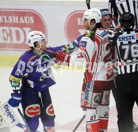 EBEL. Eishockey Bundesliga. EC VSV gegen KAC.  Brock McBride, (VSV),  Thomas Hundertpfund  (KAC). Villach, am 12.10.2014.
Foto: Kuess 


---
pressefotos, pressefotografie, kuess, qs, qspictures, sport, bild, bilder, bilddatenbank