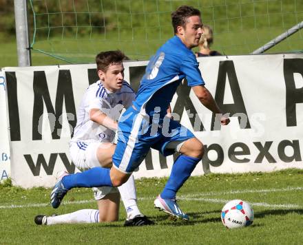 Fussball Kaerntner Liga. Annabichler SV ASV gegen Treibach. Martin Salentinig, (ASV), Hanno Ulrich Wachernig  (Treibach) . Klagenfurt, am 12.10.2014.
Foto: Kuess
---
pressefotos, pressefotografie, kuess, qs, qspictures, sport, bild, bilder, bilddatenbank