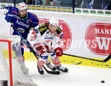 EBEL. Eishockey Bundesliga. EC VSV gegen KAC.  Eric Hunter, (VSV), Thomas Hundertpfund (KAC). Villach, am 12.10.2014.
Foto: Kuess 


---
pressefotos, pressefotografie, kuess, qs, qspictures, sport, bild, bilder, bilddatenbank