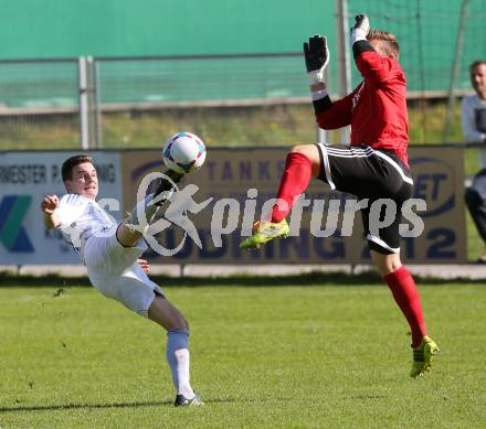 Fussball Kaerntner Liga. Annabichler SV ASV gegen Treibach. Patrick Christian Boeck, (ASV), Werner Buchhaeusl (Treibach) . Klagenfurt, am 12.10.2014.
Foto: Kuess
---
pressefotos, pressefotografie, kuess, qs, qspictures, sport, bild, bilder, bilddatenbank