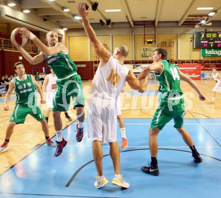 Basketball 2. Bundesliga. Woerthersee Piraten gegen KOS Celovec.  Joachim Buggelsheim, (Piraten), Fabian Gallob, Ales Kunc  (KOS). Klagenfurt, am 18.10.2014.
Foto: Kuess
---
pressefotos, pressefotografie, kuess, qs, qspictures, sport, bild, bilder, bilddatenbank