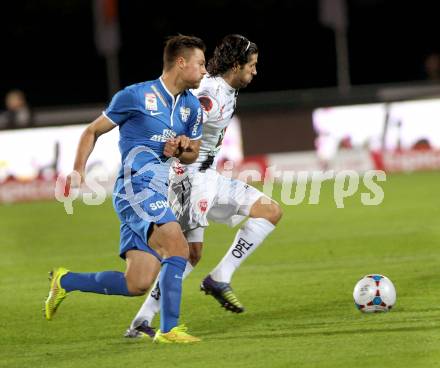 Fussball Bundesliga. RZ Pellets WAC gegen SV Scholz Groedig. Jacobo Ynclan Pajares,  (WAC), Timo Brauer (Groedig). Wolfsberg, am 18.10.2014.
Foto: Kuess

---
pressefotos, pressefotografie, kuess, qs, qspictures, sport, bild, bilder, bilddatenbank