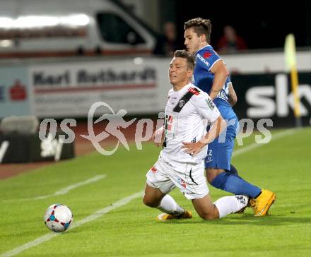 Fussball Bundesliga. RZ Pellets WAC gegen SV Scholz Groedig. Christopher Wernitznig,  (WAC), Christoph Martschinko (Groedig). Wolfsberg, am 18.10.2014.
Foto: Kuess

---
pressefotos, pressefotografie, kuess, qs, qspictures, sport, bild, bilder, bilddatenbank