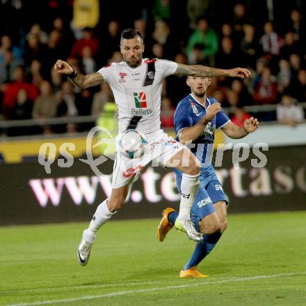 Fussball Bundesliga. RZ Pellets WAC gegen SV Scholz Groedig. Attila Simon, (WAC), Marvin Potzmann  (Groedig). Wolfsberg, am 18.10.2014.
Foto: Kuess

---
pressefotos, pressefotografie, kuess, qs, qspictures, sport, bild, bilder, bilddatenbank