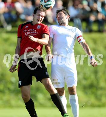 Fussball Kaerntner Liga. Maria Saal gegen Annabichler SV. Rok Smid,  (Maria Saal), Almedin Hota (ASV). Maria Saal, am 18.10.2014.
Foto: Kuess
---
pressefotos, pressefotografie, kuess, qs, qspictures, sport, bild, bilder, bilddatenbank