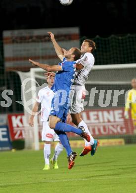 Fussball Bundesliga. RZ Pellets WAC gegen SV Scholz Groedig. Boris Huettenbrenner, (WAC), Matthias Maak (Groedig). Wolfsberg, am 18.10.2014.
Foto: Kuess

---
pressefotos, pressefotografie, kuess, qs, qspictures, sport, bild, bilder, bilddatenbank