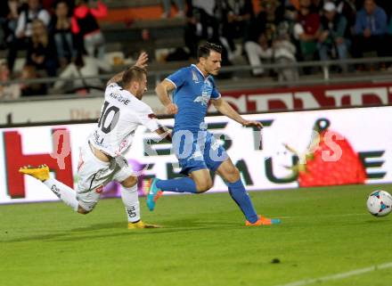 Fussball Bundesliga. RZ Pellets WAC gegen SV Scholz Groedig. Peter Zulj, (WAC), Robert Strobl  (Groedig). Wolfsberg, am 18.10.2014.
Foto: Kuess

---
pressefotos, pressefotografie, kuess, qs, qspictures, sport, bild, bilder, bilddatenbank