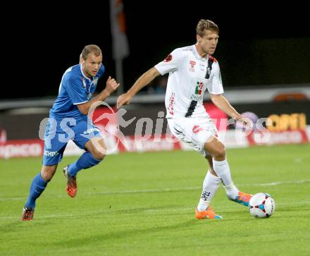 Fussball Bundesliga. RZ Pellets WAC gegen SV Scholz Groedig. Boris Huettenbrenner (WAC), Matthias Maak (Groedig). Wolfsberg, am 18.10.2014.
Foto: Kuess

---
pressefotos, pressefotografie, kuess, qs, qspictures, sport, bild, bilder, bilddatenbank