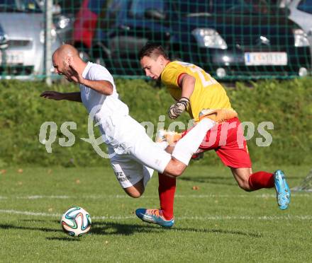 Fussball Kaerntner Liga. Maria Saal gegen Annabichler SV. Wolfgang Karner, (Maria Saal), Stephan Stueckler  (ASV). Maria Saal, am 18.10.2014.
Foto: Kuess
---
pressefotos, pressefotografie, kuess, qs, qspictures, sport, bild, bilder, bilddatenbank