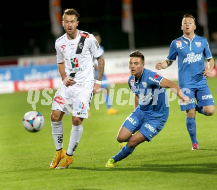 Fussball Bundesliga. RZ Pellets WAC gegen SV Scholz Groedig. Peter Zulj, (WAC), Timo Brauer (Groedig). Wolfsberg, am 18.10.2014.
Foto: Kuess

---
pressefotos, pressefotografie, kuess, qs, qspictures, sport, bild, bilder, bilddatenbank