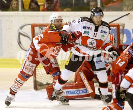 EBEL. Eishockey Bundesliga. KAC gegen HC Orli Znojmo. Kirk Furey,  (KAC),  Branislav Rehus (Znojmo). Klagenfurt, am 24.10.2014.
Foto: Kuess 

---
pressefotos, pressefotografie, kuess, qs, qspictures, sport, bild, bilder, bilddatenbank