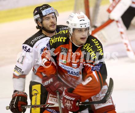 EBEL. Eishockey Bundesliga. KAC gegen HC Orli Znojmo. Luke Pither, (KAC),  Branislav Rehus  (Znojmo). Klagenfurt, am 24.10.2014.
Foto: Kuess 

---
pressefotos, pressefotografie, kuess, qs, qspictures, sport, bild, bilder, bilddatenbank