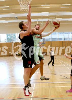 Basketball 2. Bundesliga. Panaceo Raiders Villach gegen Mistelbach Mustangs. Blaz Lobe, (Villach), Ivo Prachar  (Mistelbach). Villach, am 26.10.2014.
Foto: Kuess
---
pressefotos, pressefotografie, kuess, qs, qspictures, sport, bild, bilder, bilddatenbank