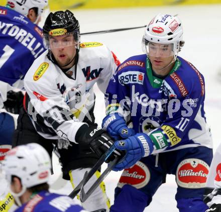 EBEL. Eishockey Bundesliga. EC VSV gegen Dornbirner Eishockey Club.  Brock McBride, (VSV), James Arniel (Dornbirn). Villach, am 26.10.2014.
Foto: Kuess 


---
pressefotos, pressefotografie, kuess, qs, qspictures, sport, bild, bilder, bilddatenbank