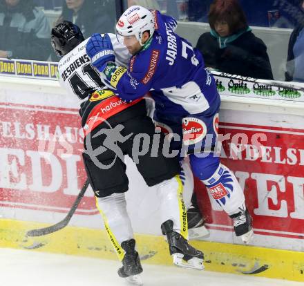 EBEL. Eishockey Bundesliga. EC VSV gegen Dornbirner Eishockey Club.  Cole Jarrett,  (VSV), Guillaume Desbiens (Dornbirn). Villach, am 26.10.2014.
Foto: Kuess 


---
pressefotos, pressefotografie, kuess, qs, qspictures, sport, bild, bilder, bilddatenbank