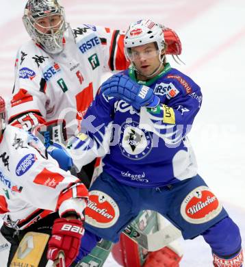 EBEL. Eishockey Bundesliga. EC VSV gegen HC TWK Innsbruck. John Lammers,  (VSV), Adam Munro (Innsbruck). Villach, am 28.10.2014.
Foto: Kuess 


---
pressefotos, pressefotografie, kuess, qs, qspictures, sport, bild, bilder, bilddatenbank