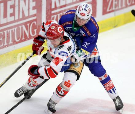 EBEL. Eishockey Bundesliga. EC VSV gegen HC TWK Innsbruck.  Adis Alagic, (VSV), Florian Stern (Innsbruck). Villach, am 28.10.2014.
Foto: Kuess 


---
pressefotos, pressefotografie, kuess, qs, qspictures, sport, bild, bilder, bilddatenbank