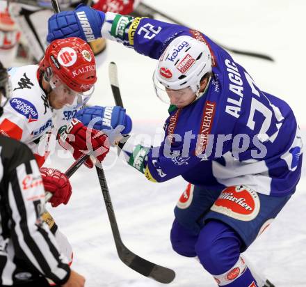 EBEL. Eishockey Bundesliga. EC VSV gegen HC TWK Innsbruck. Adis Alagic,  (VSV), Andreas Valdix (Innsbruck). Villach, am 28.10.2014.
Foto: Kuess 


---
pressefotos, pressefotografie, kuess, qs, qspictures, sport, bild, bilder, bilddatenbank