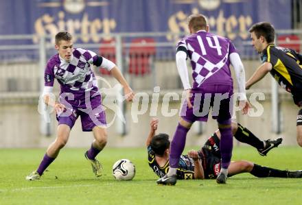 Fussball Regionalliga. SK Austria Klagenfurt gegen Lafnitz. Patrik Eler (Austria Klagenfurt), Karlo Simek (Lafnitz). Klagenfurt, 31.10.2014.
foto: Kuess
---
pressefotos, pressefotografie, kuess, qs, qspictures, sport, bild, bilder, bilddatenbank