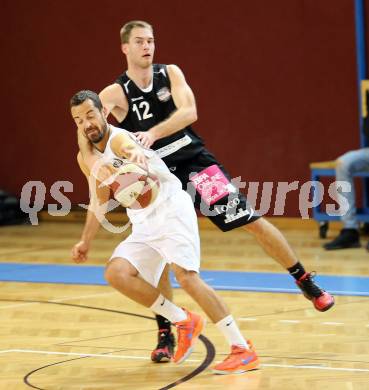 Basketball 2. Bundesliga. Woerthersee Piraten gegen BK Mattersburg Rocks.  Alexander Ey, (Piraten), Sebastian Gmeiner  (Mattersburg). Klagenfurt, am 1.11.2014.
Foto: Kuess
---
pressefotos, pressefotografie, kuess, qs, qspictures, sport, bild, bilder, bilddatenbank