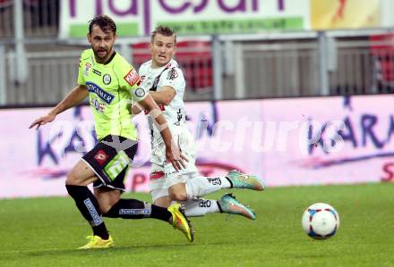 Fussball Bundesliga. RZ Pellets WAC gegen SK Puntigamer Sturm Graz. Manuel Kerhe (WAC), Michael Madl (Graz). Klagenfiurt, am 8.11.2014.
Foto: Kuess

---
pressefotos, pressefotografie, kuess, qs, qspictures, sport, bild, bilder, bilddatenbank