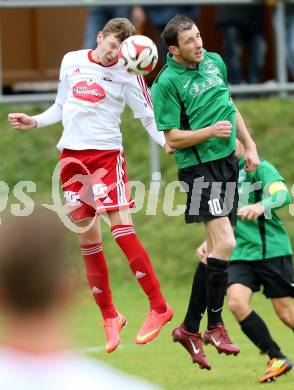 Fussball Unterliga Ost. Ludmannsdorf gegen Ulrichsberg. Miralem Ramic,  (Ludmannsdorf), Hajrush Tifeku (Ulrichsberg). Ludmannsdorf, am 9.11.2014.
Foto: Kuess
---
pressefotos, pressefotografie, kuess, qs, qspictures, sport, bild, bilder, bilddatenbank