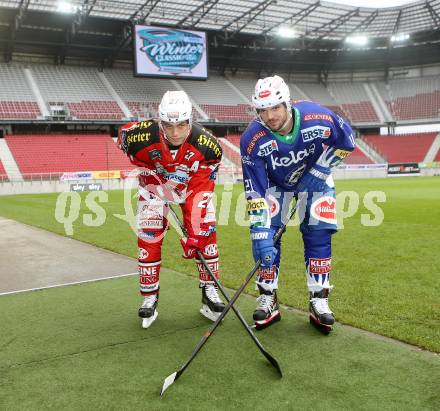 Eishockey. Kaerntner Freiluftderby. KAC gegen VSV. Thomas Hundertpfund (KAC), Benjamin Petrik (VSV). Klagenfurt Woerthersee Stadion. 11.11.2014.
Foto: Kuess 
---
pressefotos, pressefotografie, kuess, qs, qspictures, sport, bild, bilder, bilddatenbank