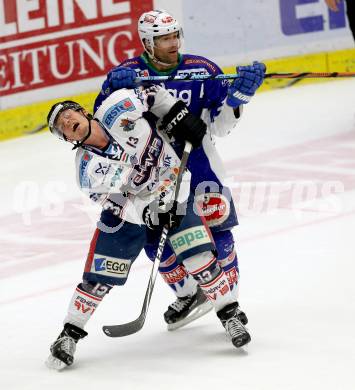 EBEL. Eishockey Bundesliga. EC VSV gegen SAPA Fehervar AV19.  Cole Jarrett, (VSV), Brandon Marino (Alba Volan). Villach, am 2.11.2014.
Foto: Kuess 


---
pressefotos, pressefotografie, kuess, qs, qspictures, sport, bild, bilder, bilddatenbank