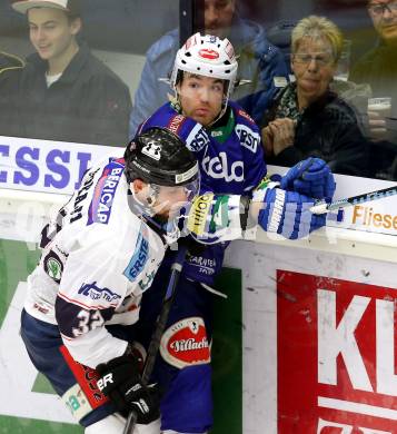 EBEL. Eishockey Bundesliga. EC VSV gegen SAPA Fehervar AV19. Brock McBride,  (VSV), Viktor Tokaji (Alba Volan). Villach, am 2.11.2014.
Foto: Kuess 


---
pressefotos, pressefotografie, kuess, qs, qspictures, sport, bild, bilder, bilddatenbank