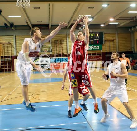 Basketball 2. Bundesliga. Woerthersee Piraten gegen Chin Min Dragons St. Poelten. Sebastian Huber,  (Piraten), Paul Radakovics (St. Poelten). Klagenfurt, 15.11.2014.
Foto: Kuess
---
pressefotos, pressefotografie, kuess, qs, qspictures, sport, bild, bilder, bilddatenbank