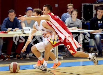 Basketball 2. Bundesliga. Woerthersee Piraten gegen Chin Min Dragons St. Poelten. Tobias Dobernig,  (Piraten), Roman Jagsch (St. Poelten). Klagenfurt, 15.11.2014.
Foto: Kuess
---
pressefotos, pressefotografie, kuess, qs, qspictures, sport, bild, bilder, bilddatenbank