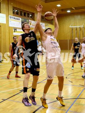 Basketball 2.Bundesliga 2014/15 Grunddurchgang 9.Runde. Radenthein Garnets gegen Basket Flames. Luka Zavrsnik,  (Radenthein), Paul Koroschitz (Basket Flames). Klagenfurt, 22.11.2014.
Foto: Kuess
---
pressefotos, pressefotografie, kuess, qs, qspictures, sport, bild, bilder, bilddatenbank