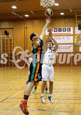 Basketball 2.Bundesliga 2014/15 Grunddurchgang 9.Runde. Radenthein Garnets gegen Basket Flames. Peter Gleissner,  (Radenthein), Vladimir Gavranic (Basket Flames). Klagenfurt, 22.11.2014.
Foto: Kuess
---
pressefotos, pressefotografie, kuess, qs, qspictures, sport, bild, bilder, bilddatenbank