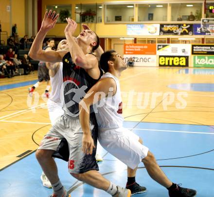 Basketball 2.Bundesliga 2014/15 Grunddurchgang 10.Runde. Woerthersee Piraten gegen Villach Raiders. Daniel Gspandl, (Piraten), Gaidys Povilas  (Villach). Klagenfurt, 29.11.2014.
Foto: Kuess
---
pressefotos, pressefotografie, kuess, qs, qspictures, sport, bild, bilder, bilddatenbank